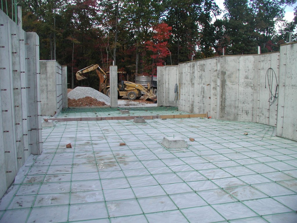 Pre-pour reinforced concrete cellar foundation with below-grade walls and slab preparation outside Houston, Texas