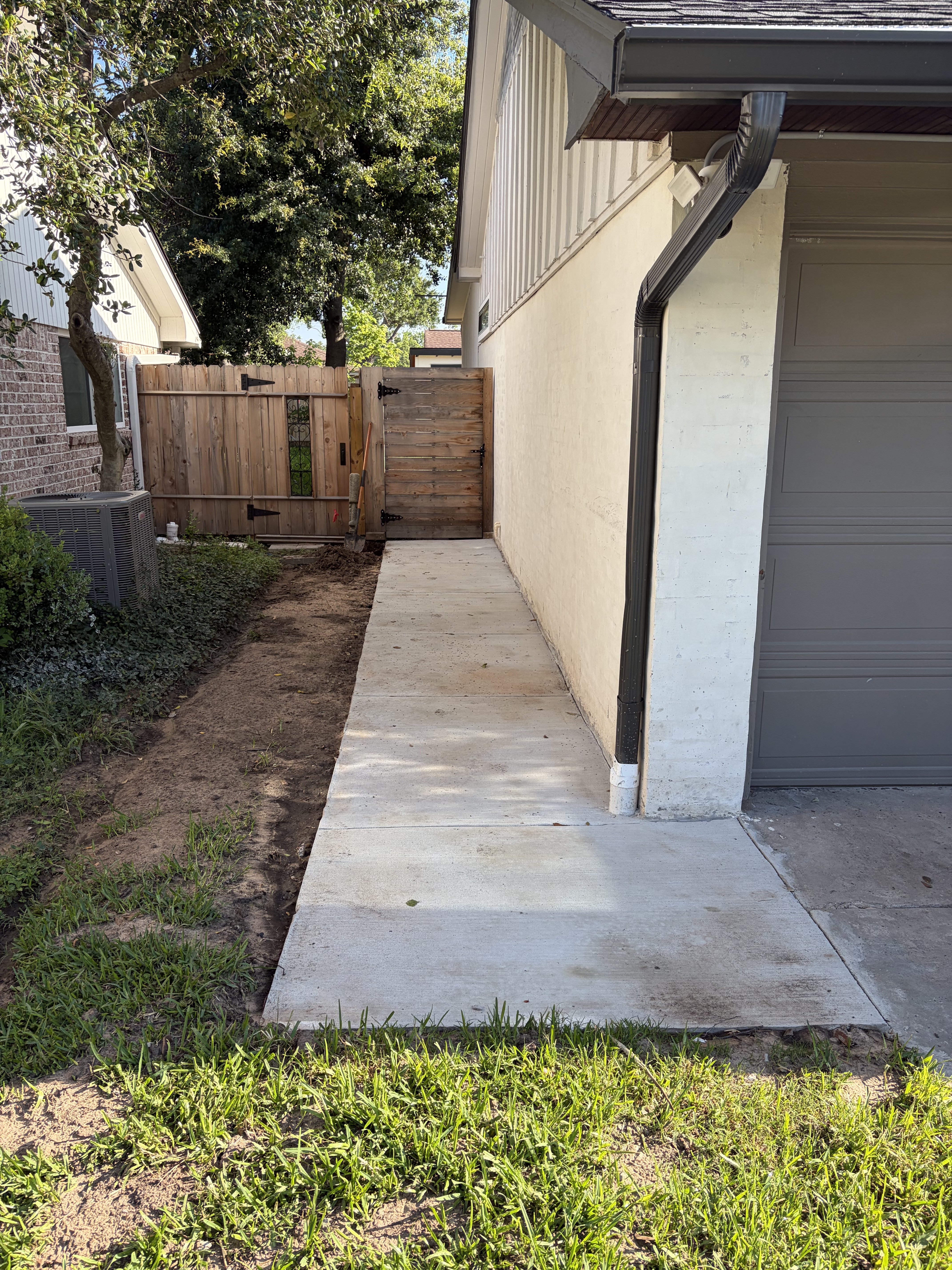 Finished new concrete sidewalk area in Houston Heights by Texas Slab Guys