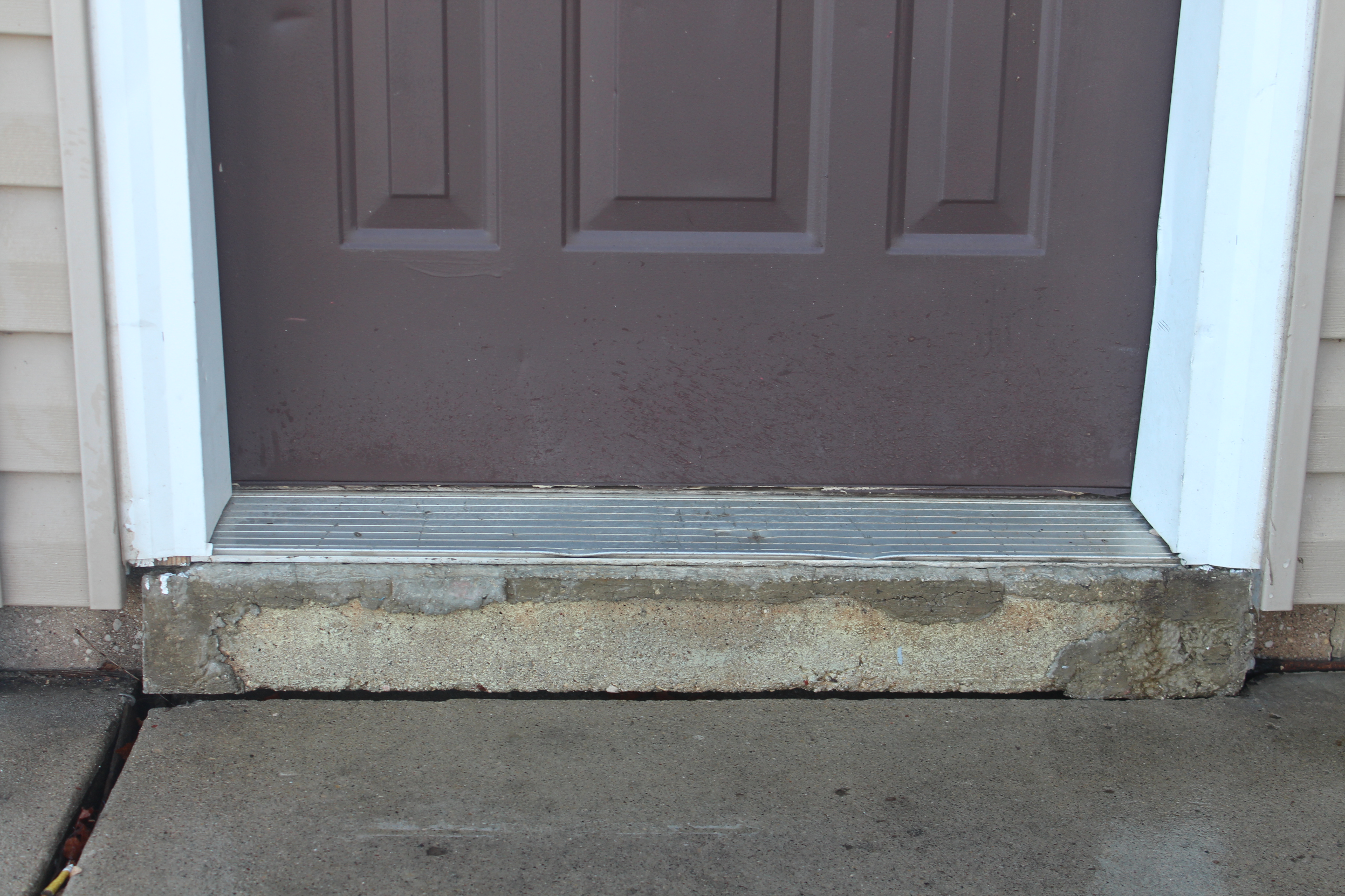 lifted and stabilized concrete steps after polyurethane foam injection Houston TX