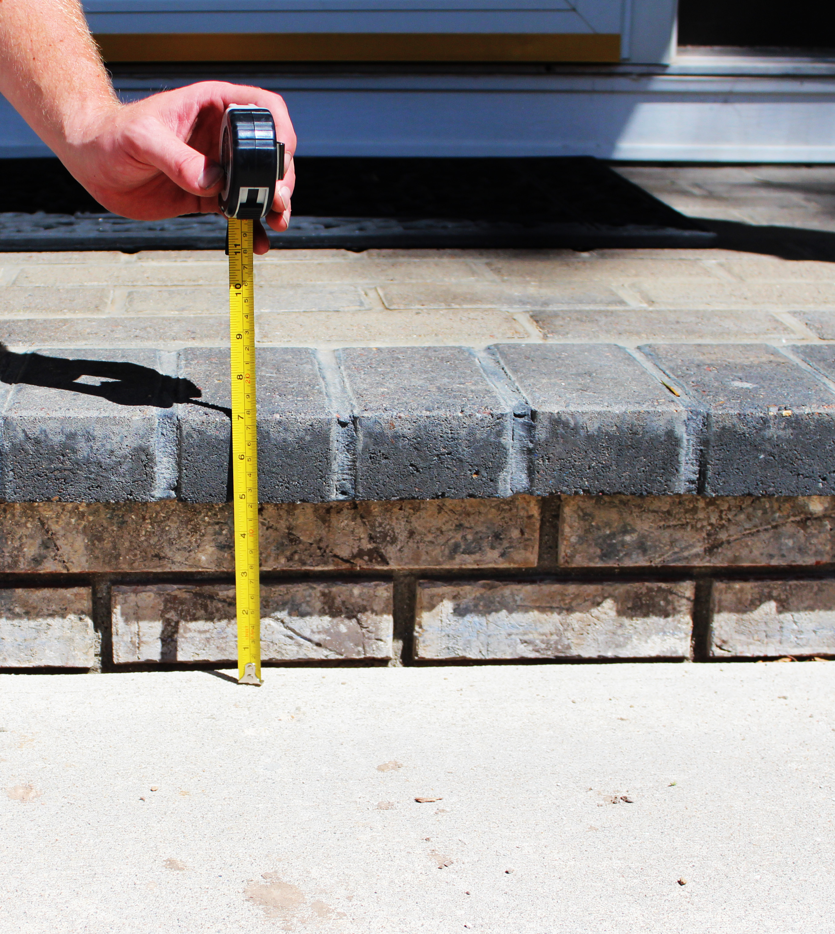 restored level concrete front porch after polyurethane foam lifting Houston TX