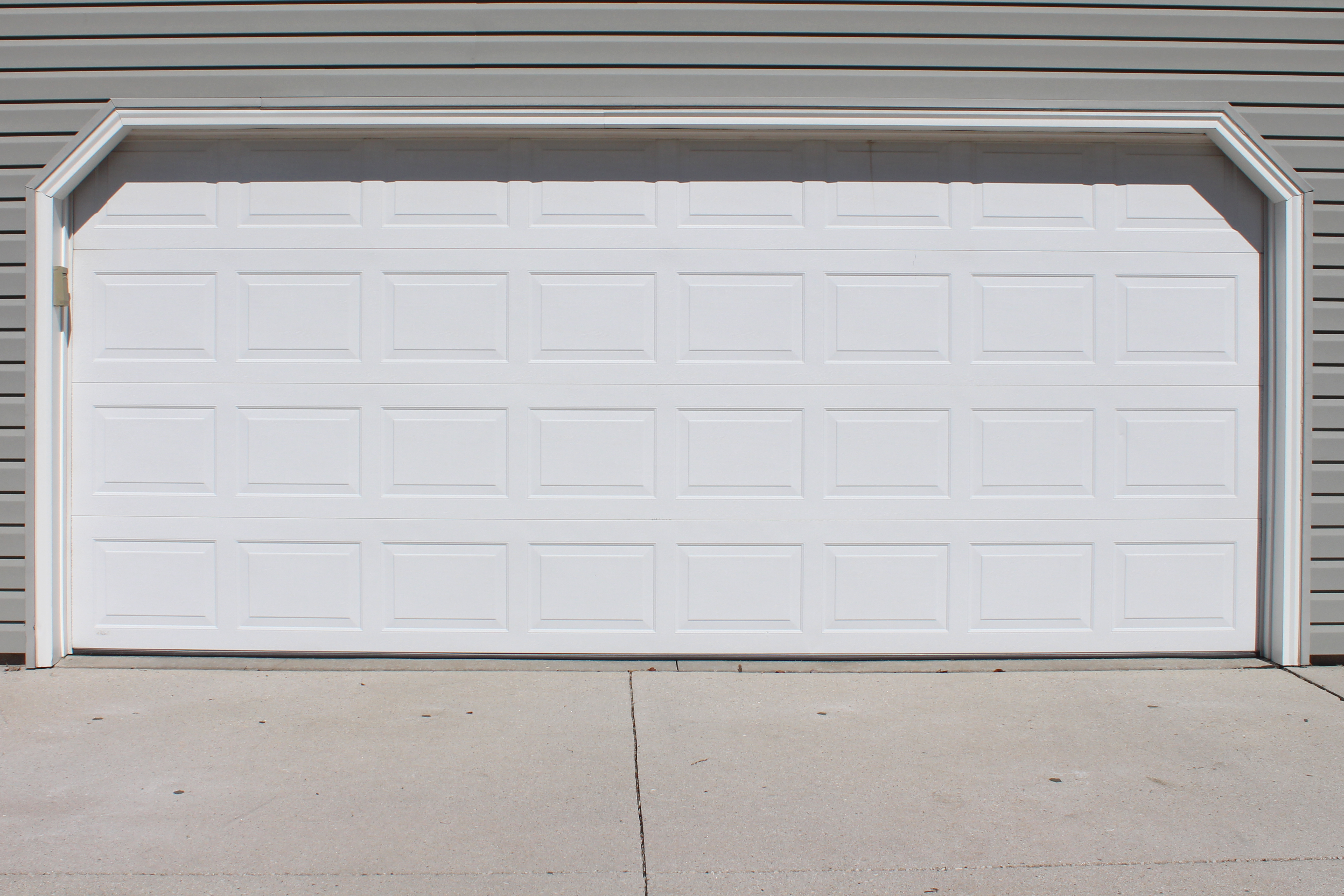 smooth level concrete garage floor after polyurethane foam injection Houston TX