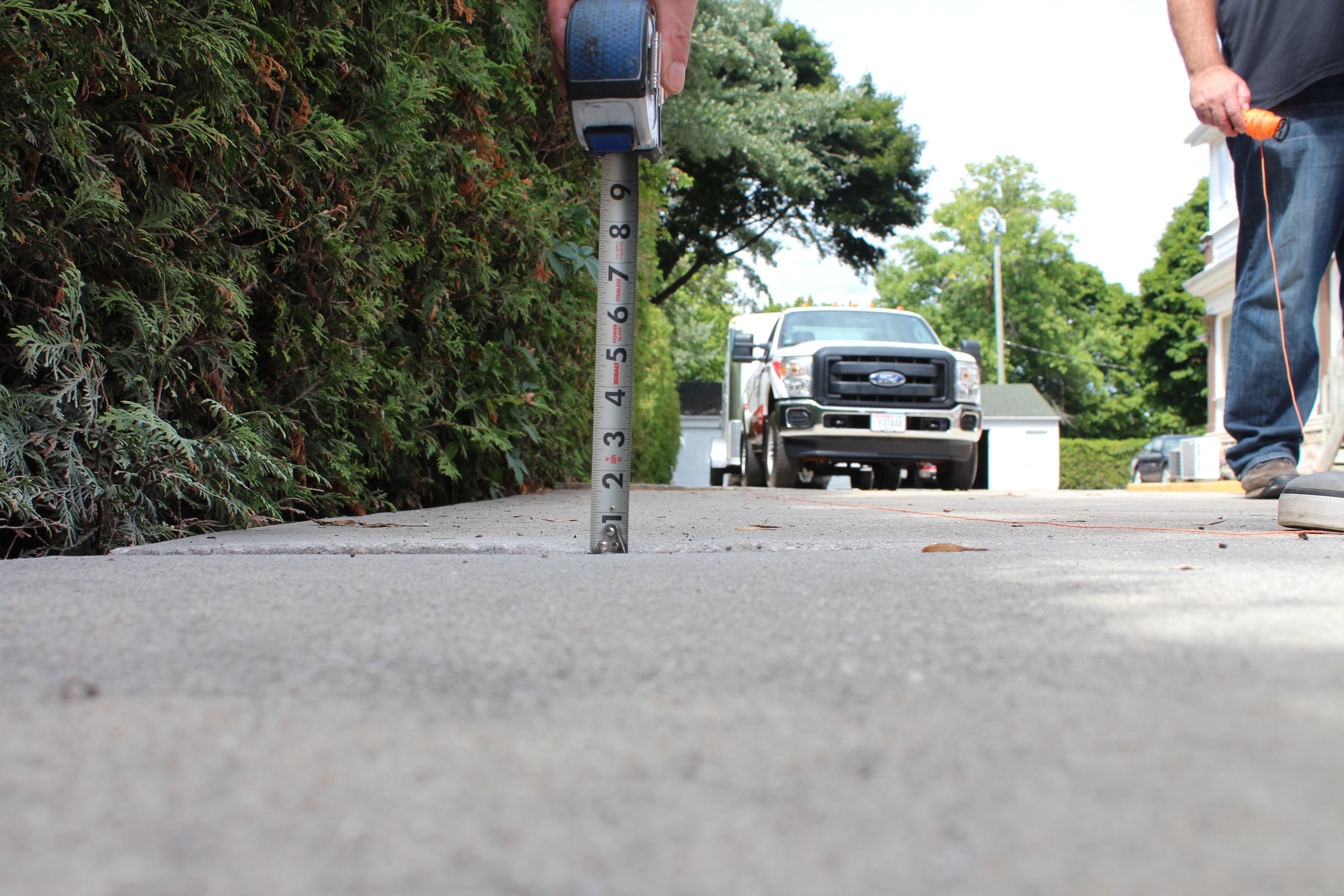 smooth level concrete sidewalk after polyurethane foam lifting Houston TX